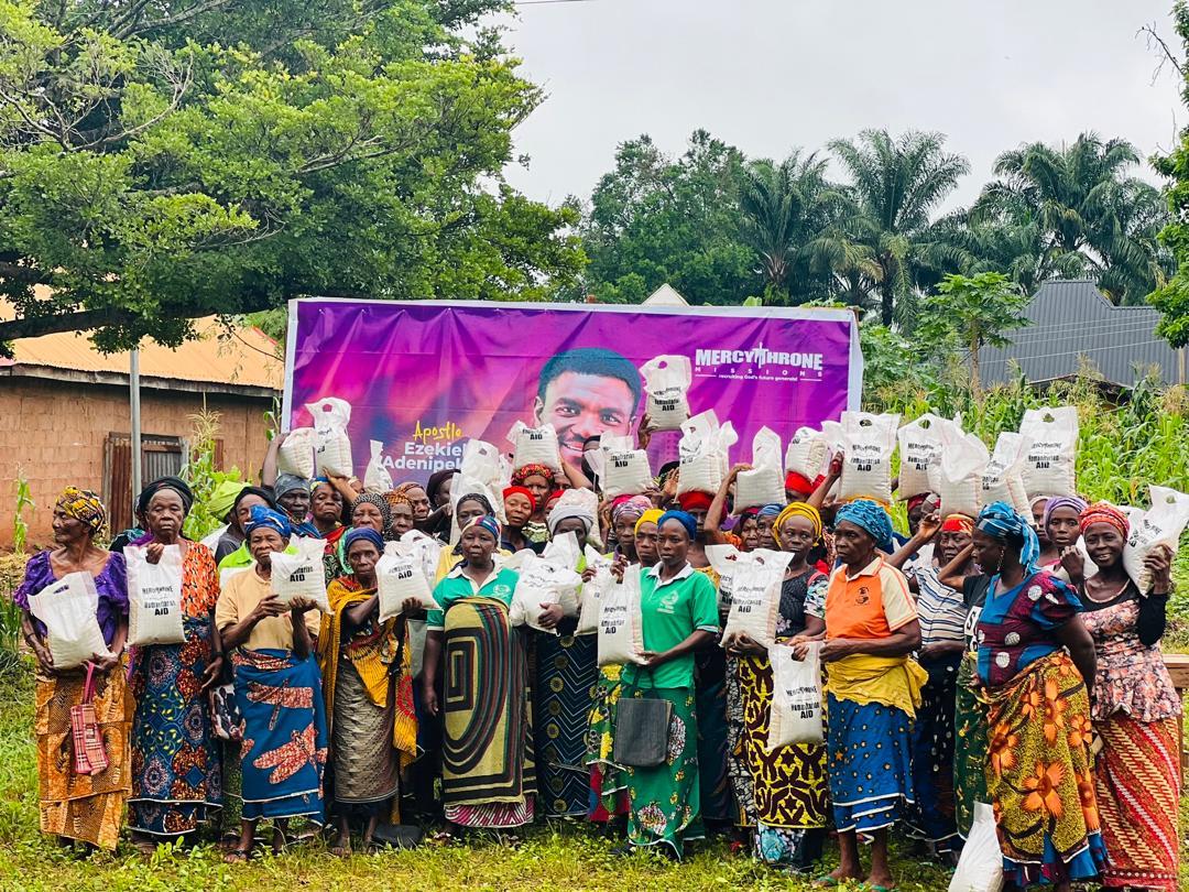 Women receiving food support during a community outreach in Nigeria
