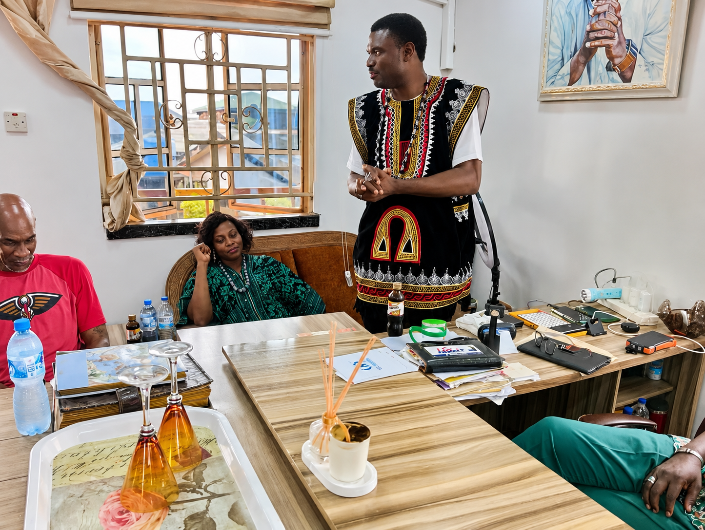 A local partner speaking during a community planning meeting